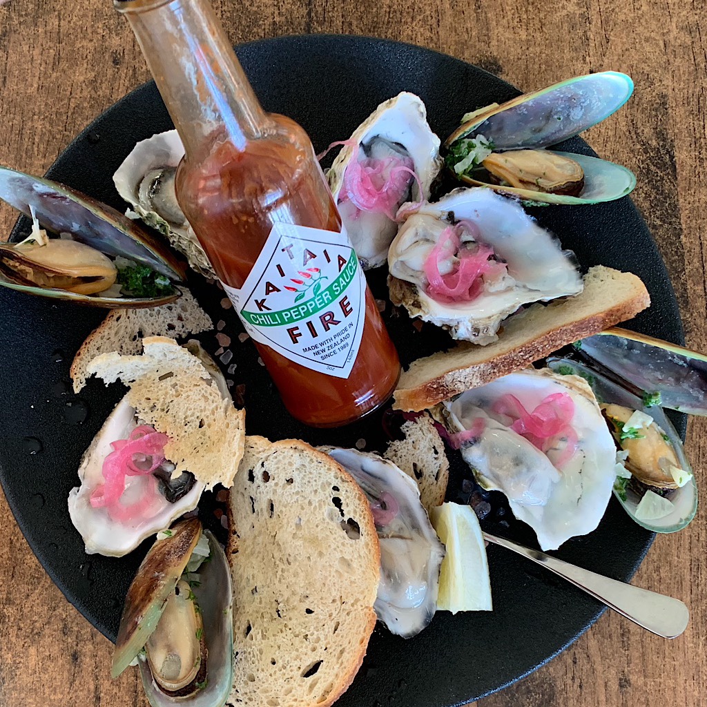 Oysters are farmed on log wooden piers in the Whangaroa Bay near Kaeo.